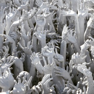 Wat Rong Khun located in the northern Thailand Province of Chiang Rai is definitely something to marvel at. The inspiration behind Wat Rong Khun, or the White Temple is Chalermchai Kositpipat, a local artist from Chiang Rai, who with his own money has completely rebuild the original temple which was in a state of disrepair. Chalermchai Kositpipat has spent approximately THB40 million of his own money on Rong Khun.